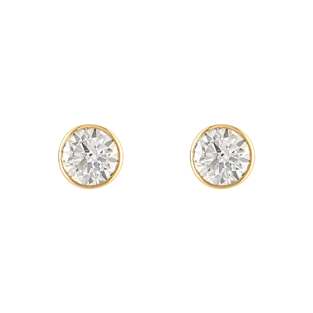 yellow gold 4mm cz rubover stud earrings on white background