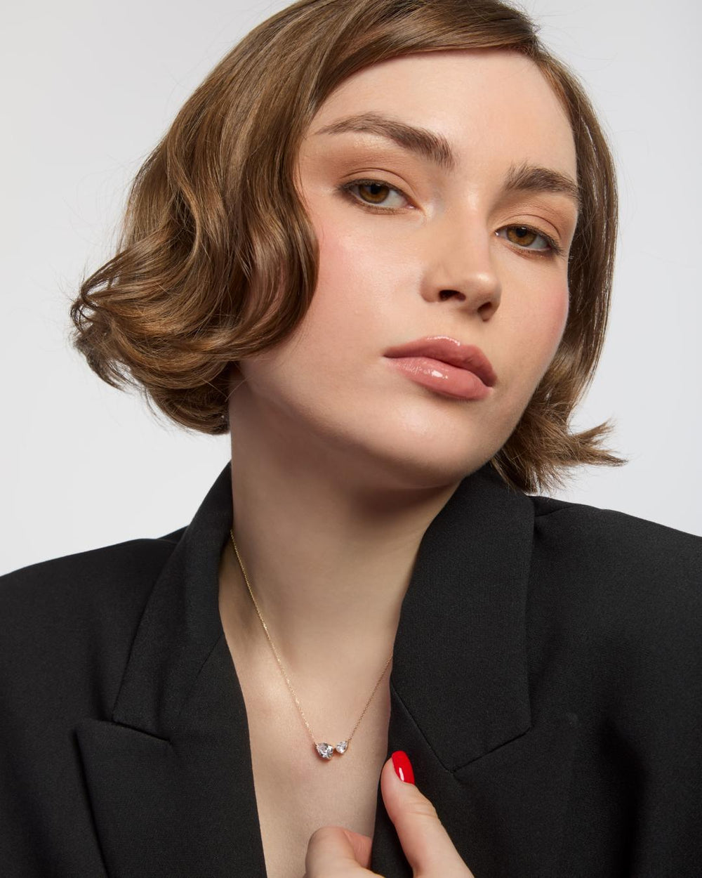 model wearing 9ct gold cz pear necklace