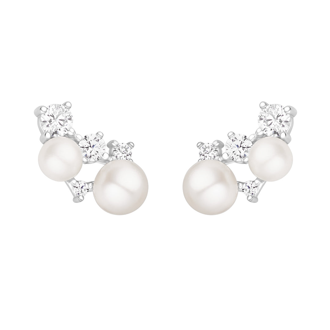 silver pearl and cubic zirconia climber earrings on white background