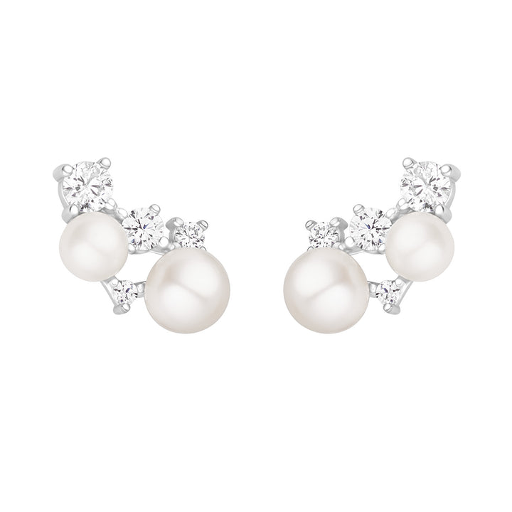 silver pearl and cubic zirconia climber earrings on white background