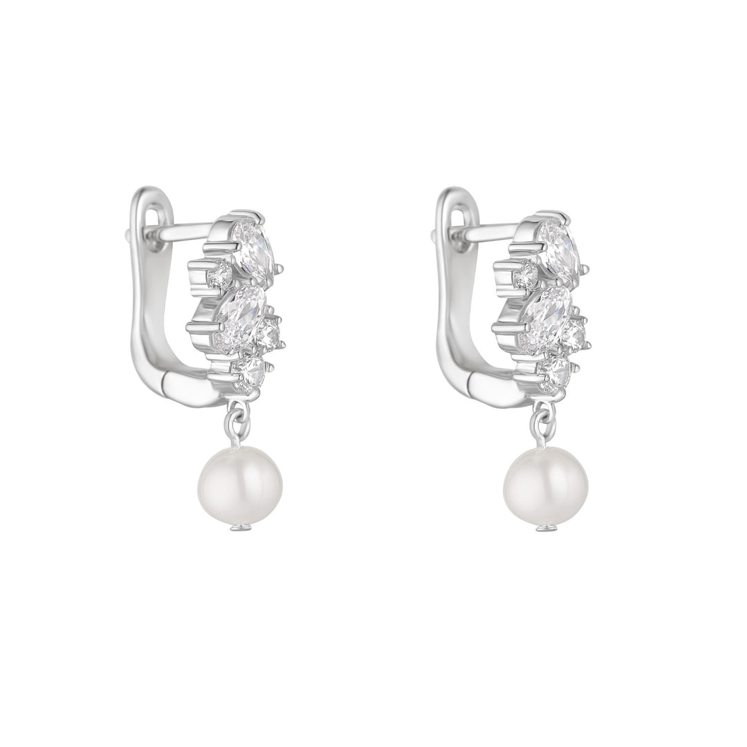 silver horseshoe cz huggie earrings with pearl drop on white background