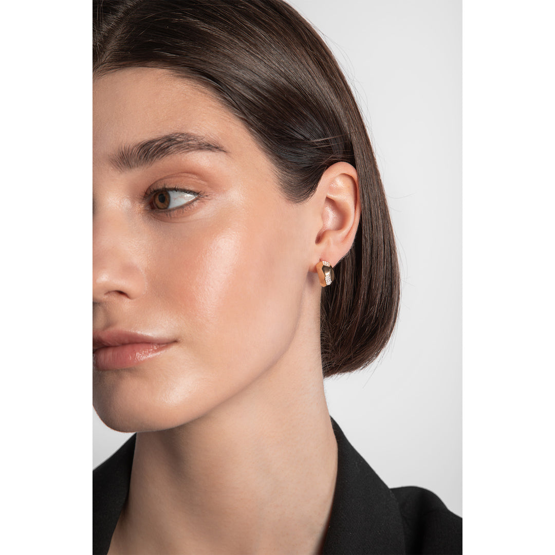 model wearing gold plated hoop earrings with cz from NJO Designs