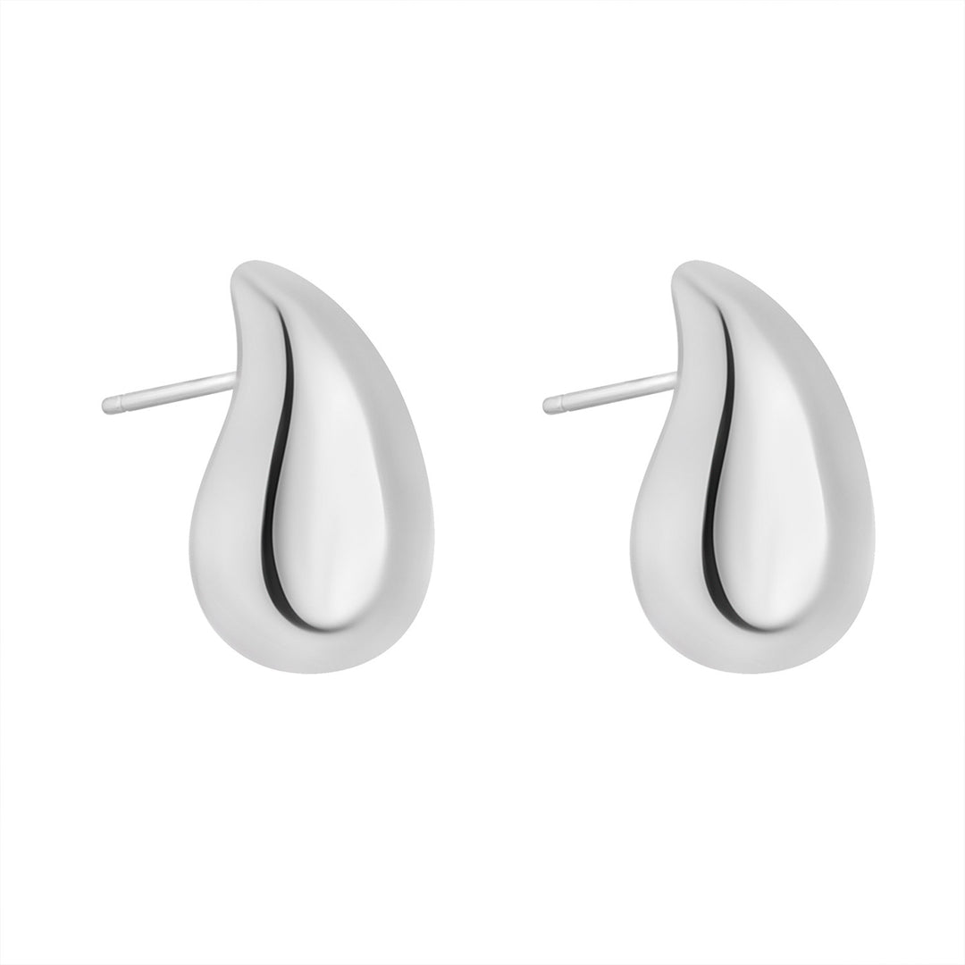 silver chunky teardrop earrings on white background