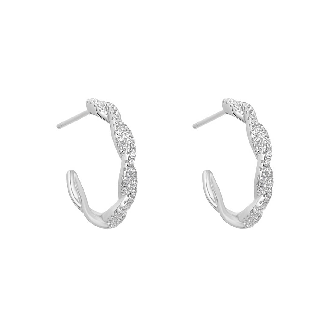 silver cz twisted hoop earrings on white background