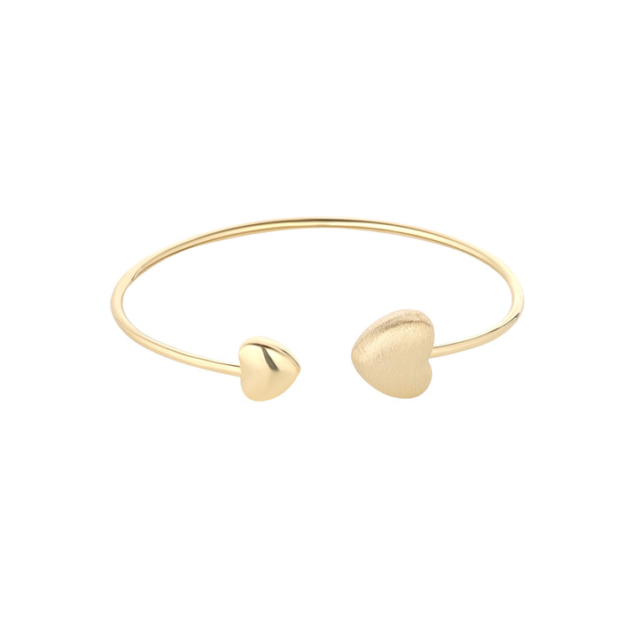 gold plated double heart open bangle on white background