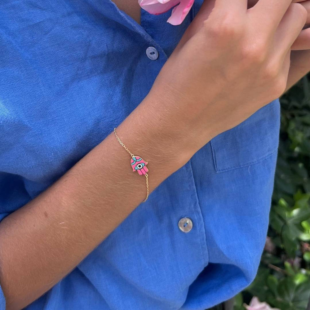 gold plated pink hand of fatima bracelet on model