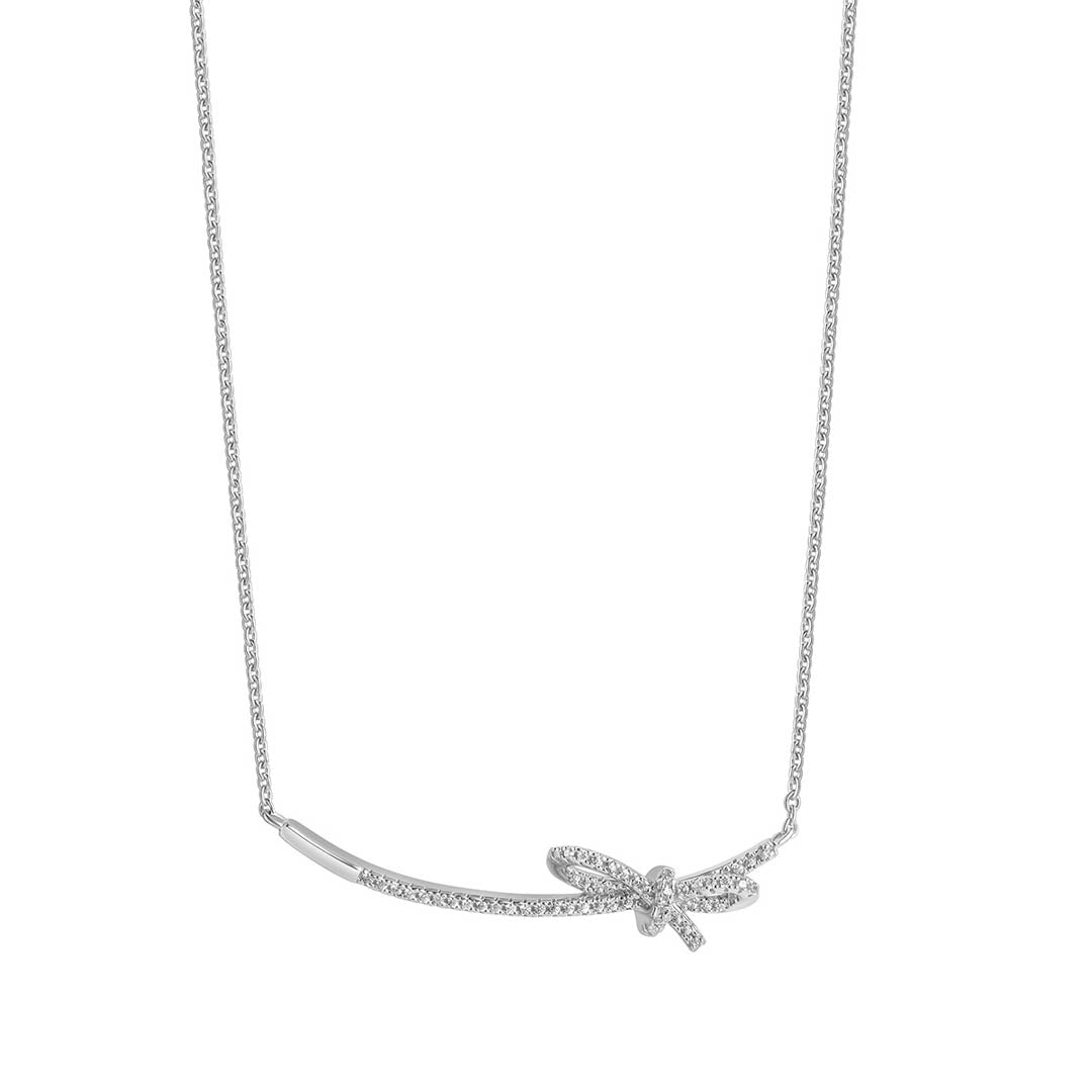silver cz bow necklace on white background