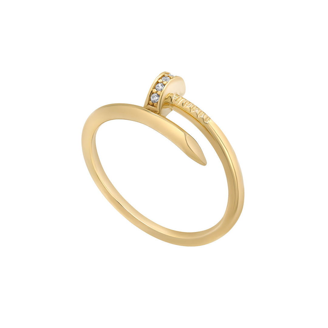 9ct gold nail ring on white background