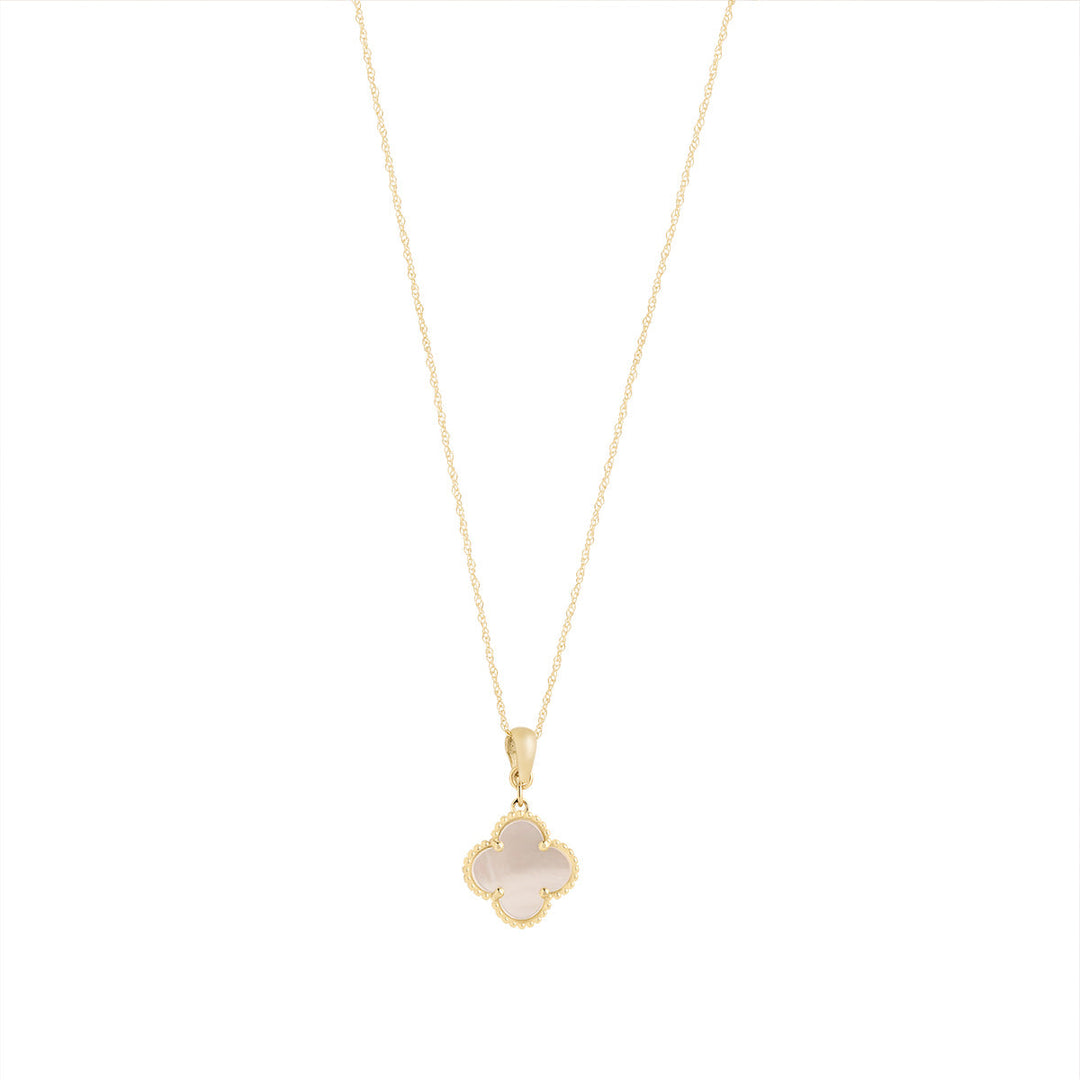9ct gold mother of pearl clover pendant on white background