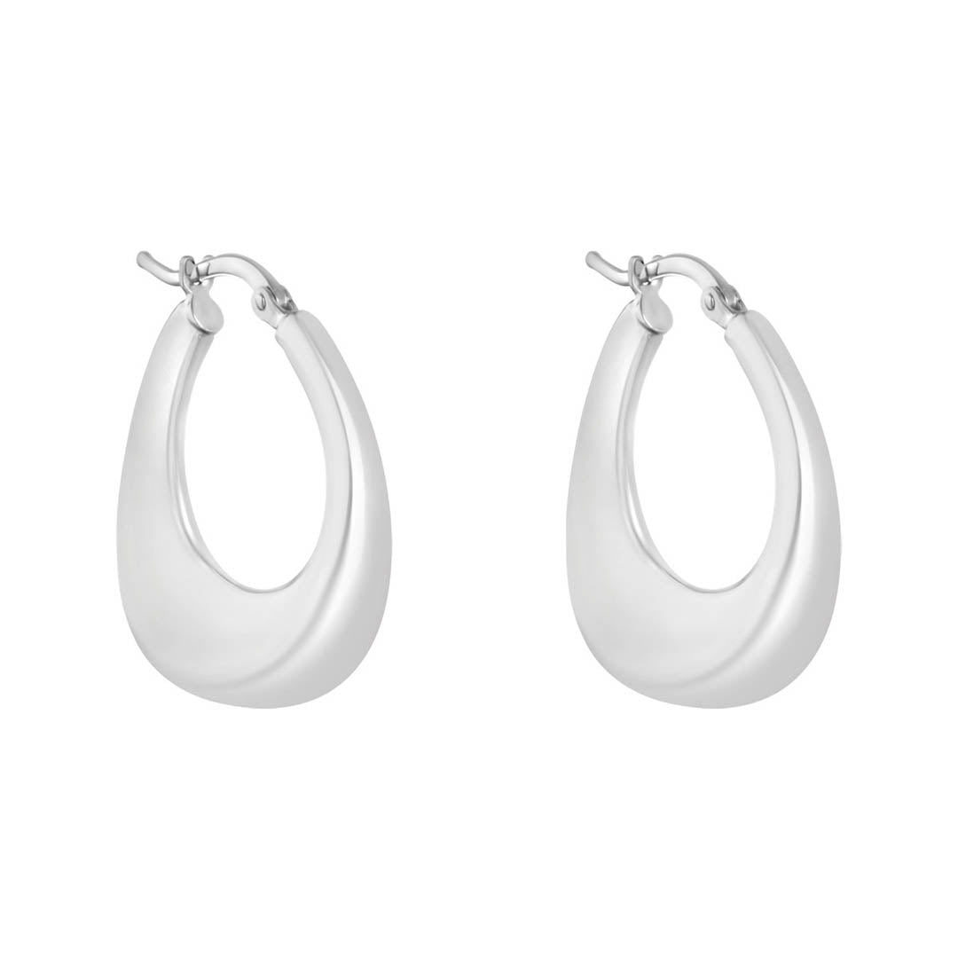 silver graduated open hoop earrings on white background