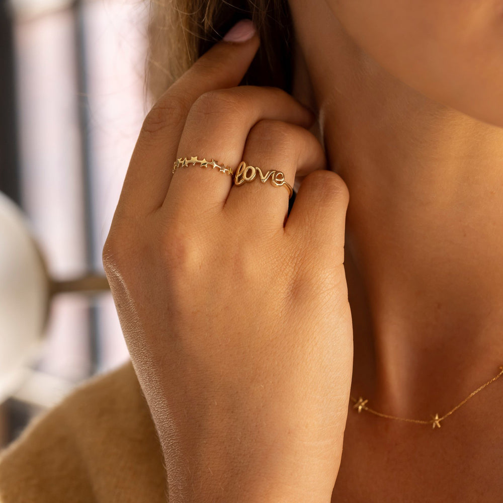 9ct gold star ring on model