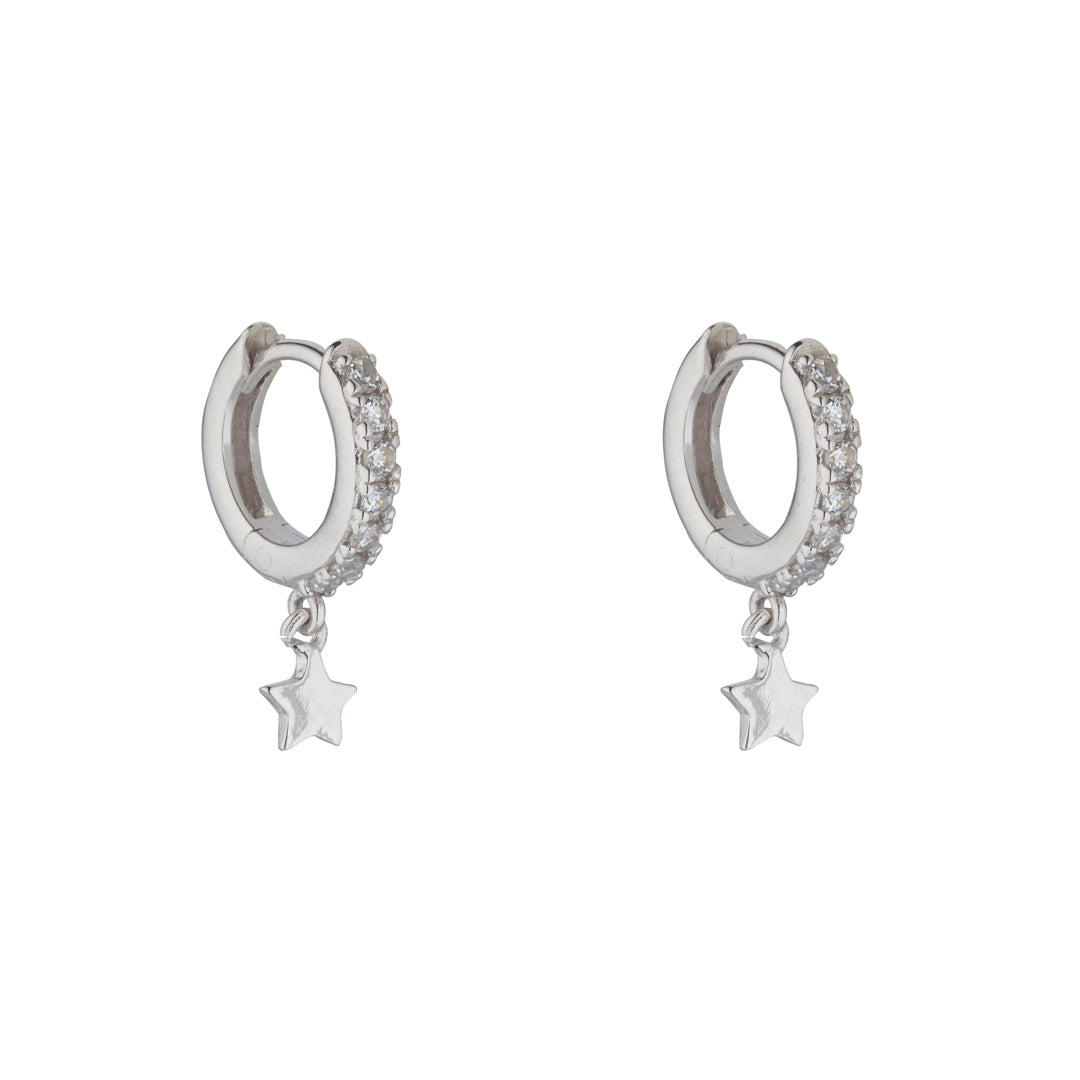 silver star drop cubic huggie earrings on white background