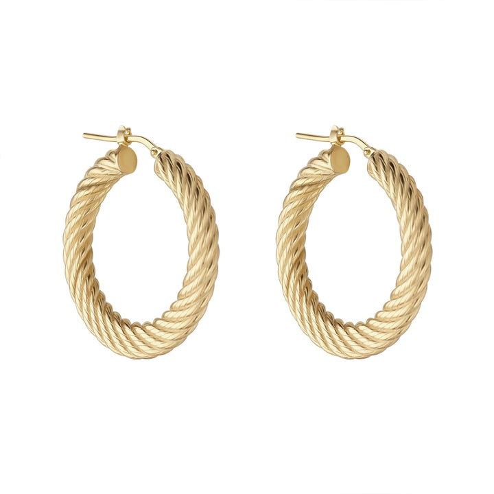 gold large croissant hoop earrings on white background