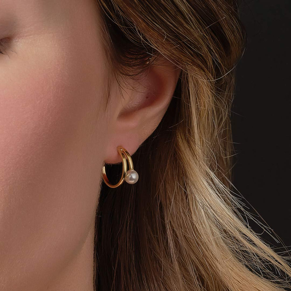gold plated pearl hoop earrings on model