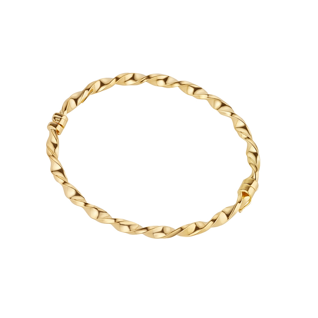 gold plated ribbon twist bangle on white background