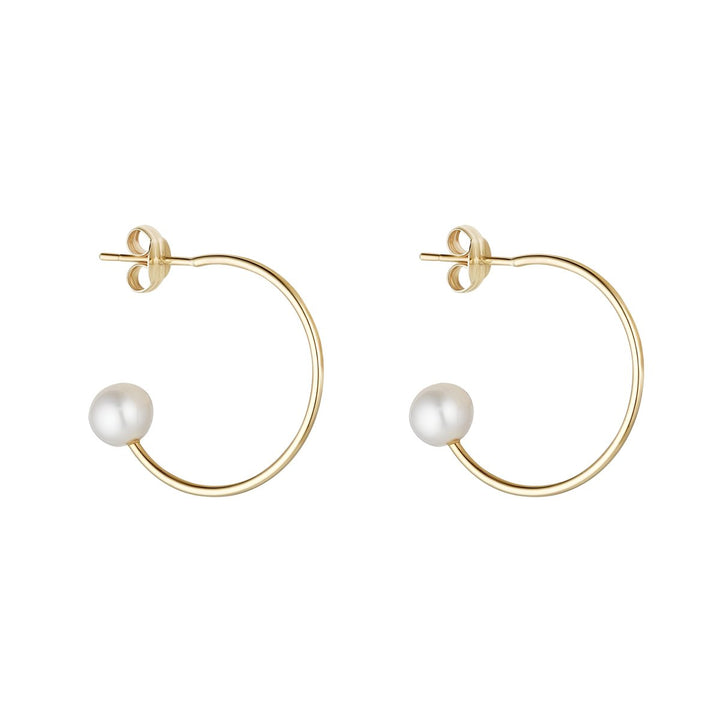 9ct gold hoop earrings with pearl tip on white background