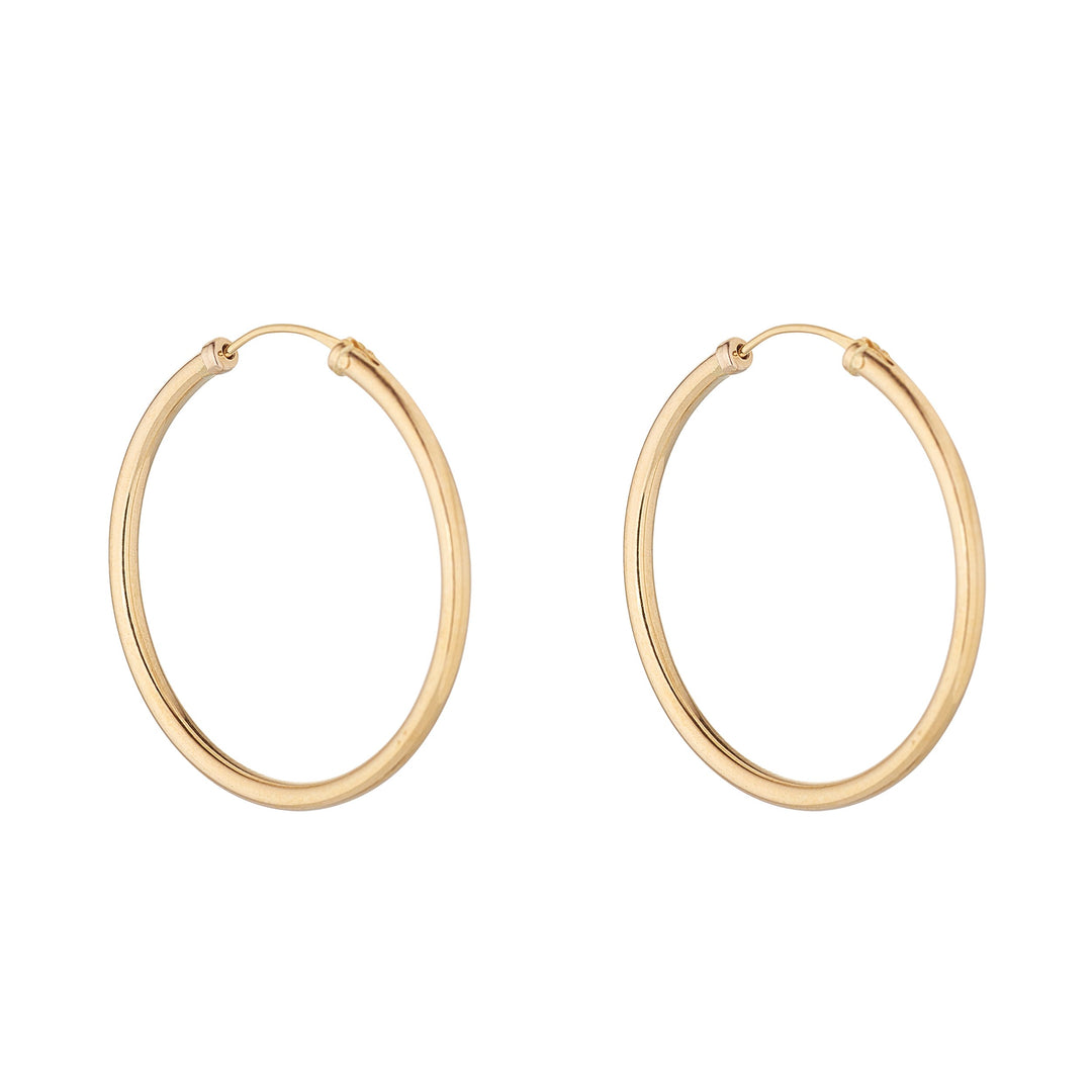 9ct gold 30mm sleeper hoop earrings on white background