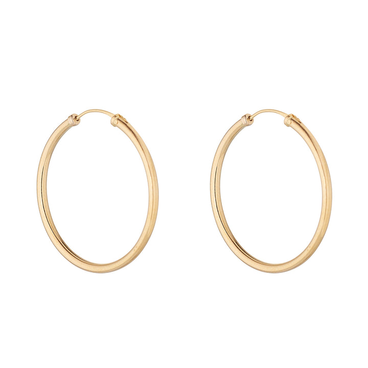 9ct gold 30mm sleeper hoop earrings on white background
