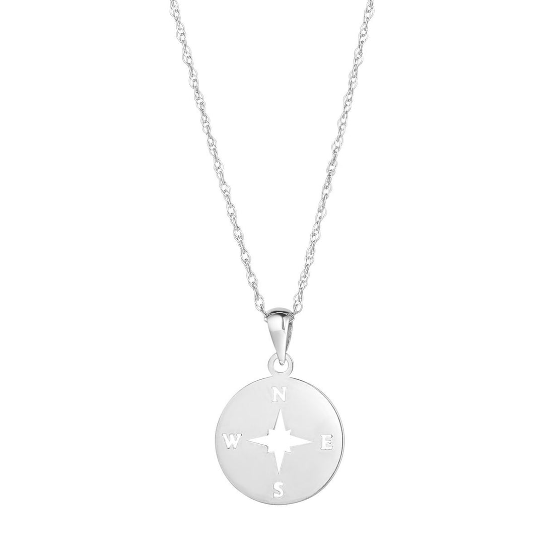 white gold compass pendant on white background