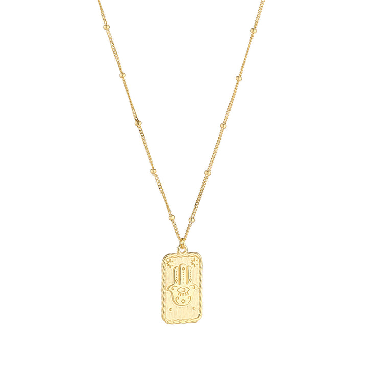 9ct gold hand of fatima tarot card pendant on white background