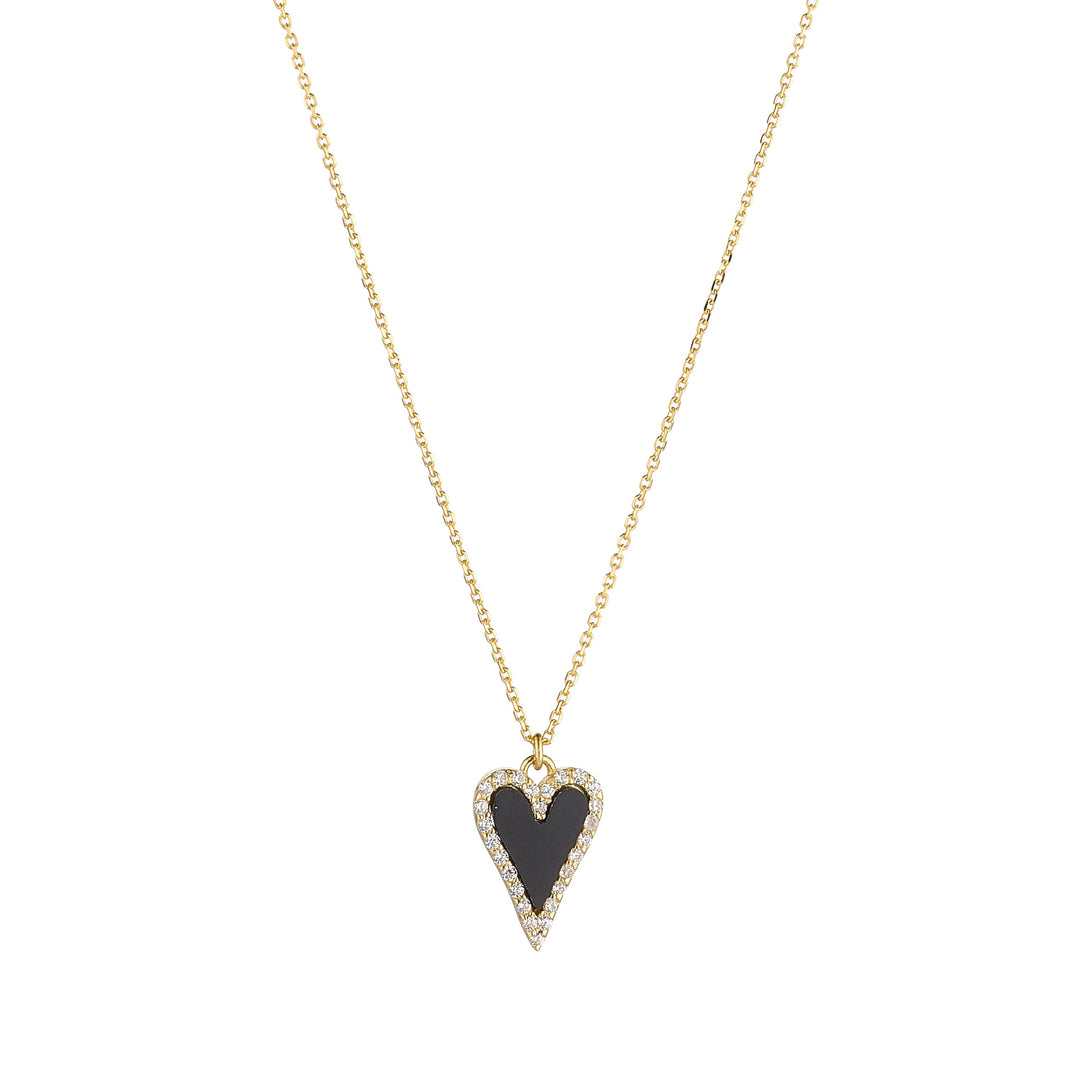 black onyx and cubic zirconia heart pendant on white background