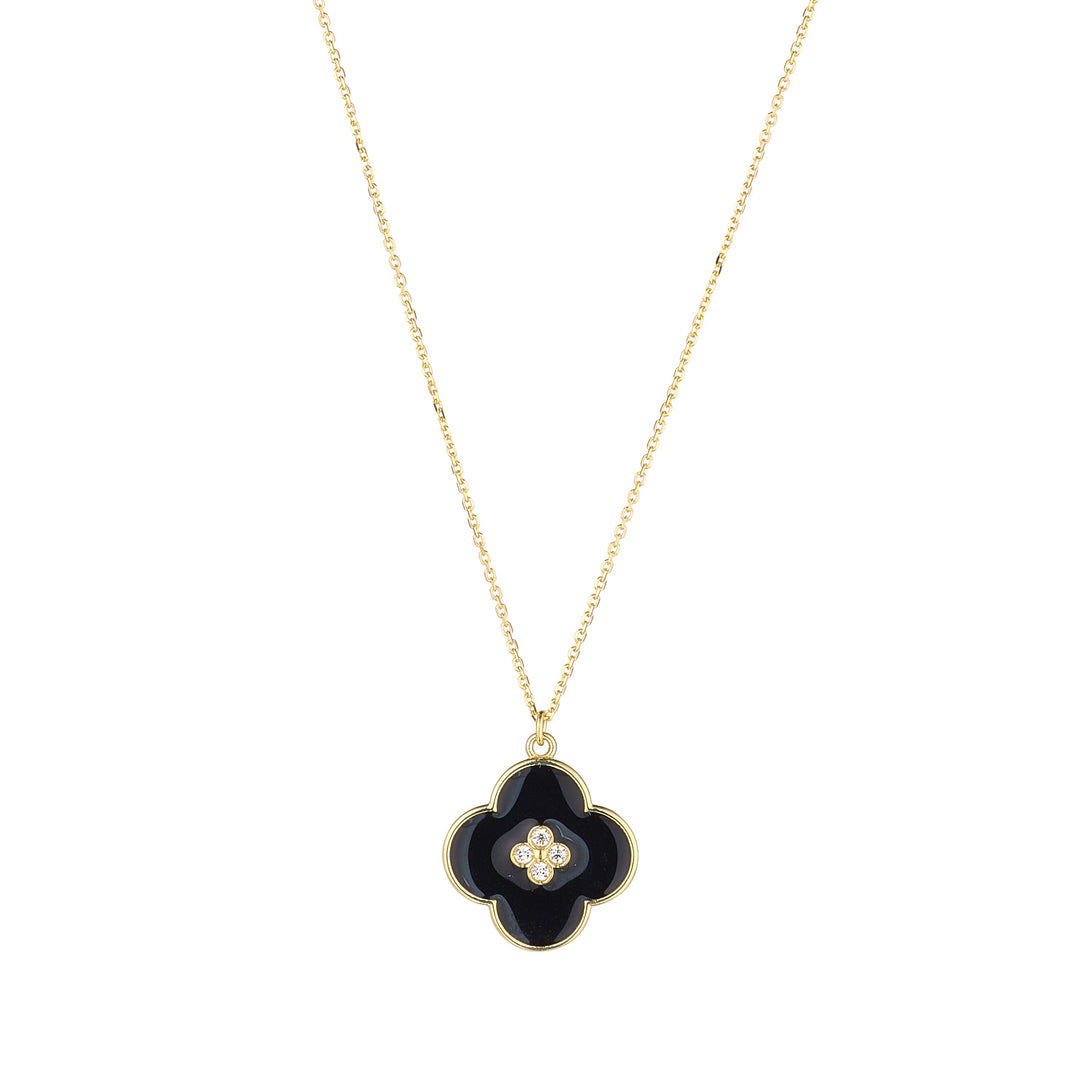 9ct gold black enamel flower cubic zirconia centre pendant on white background