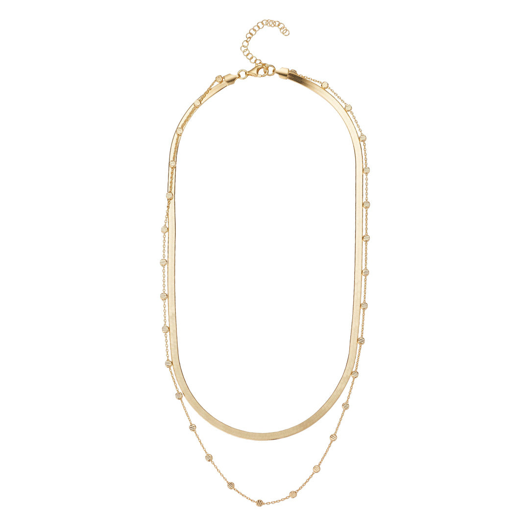 gold plated layered double chain necklet on white background