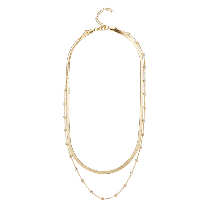 gold plated layered double chain necklet on white background