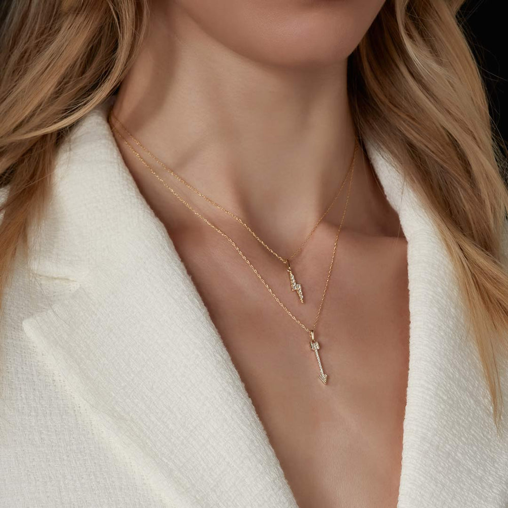 gold necklace stack on model