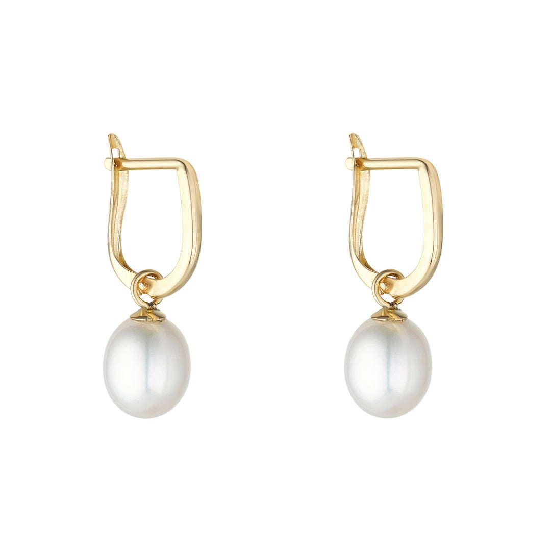 9ct gold horseshoe huggie earrings with pearl drop on white background