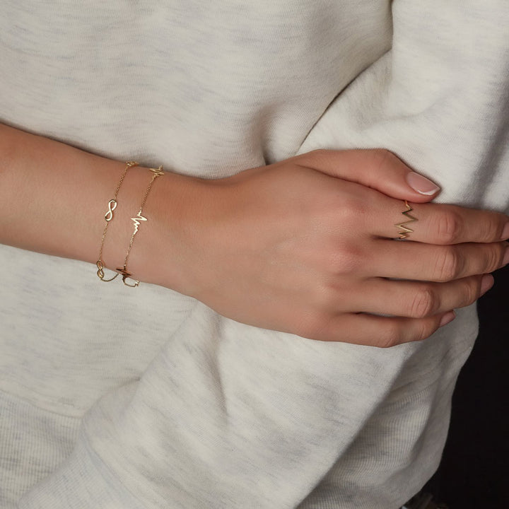 model wearing matching solid gold jewellery