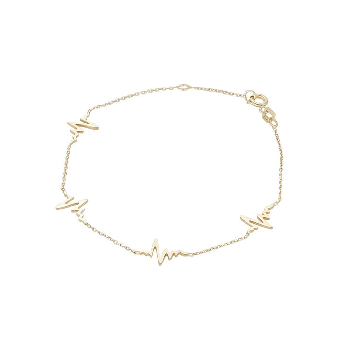 9ct gold 4 heartbeat bracelet on white background