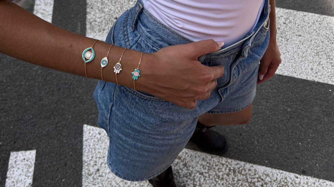 summer layered bracelet set on model's hand