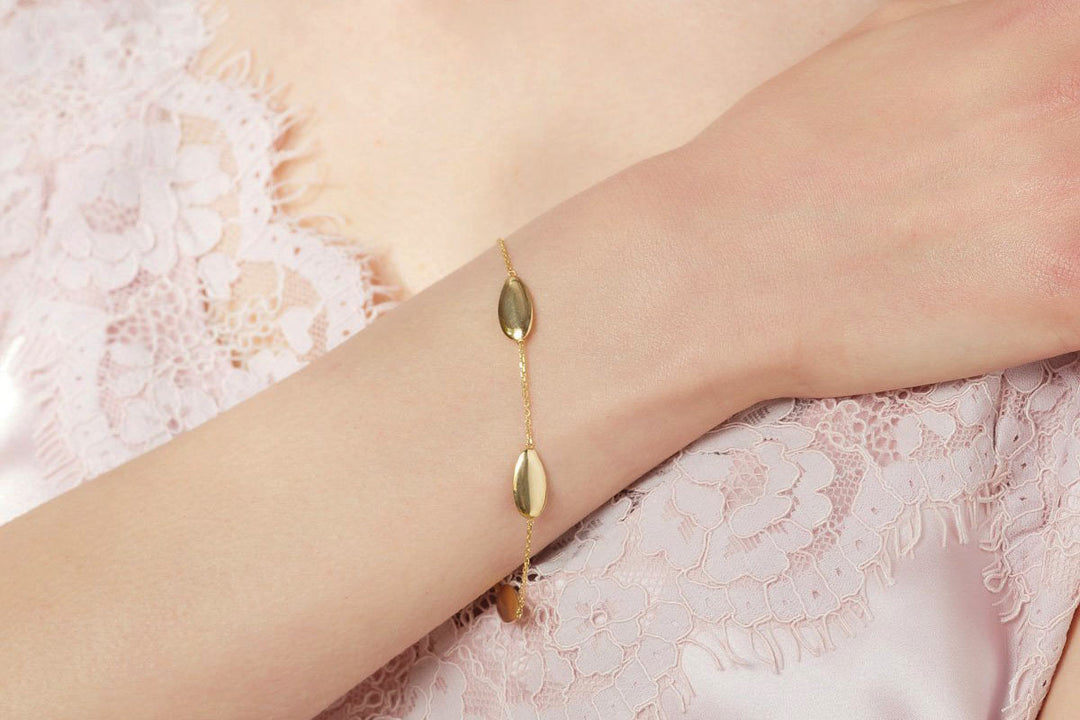 yellow gold bracelet on model