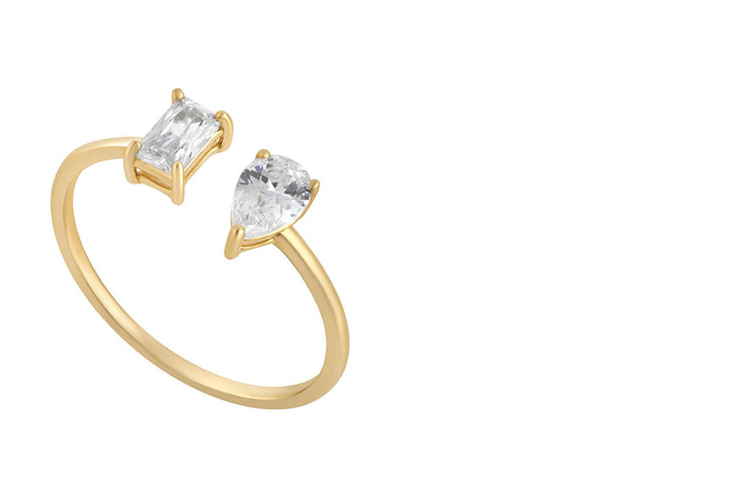 yellow gold ring on white background