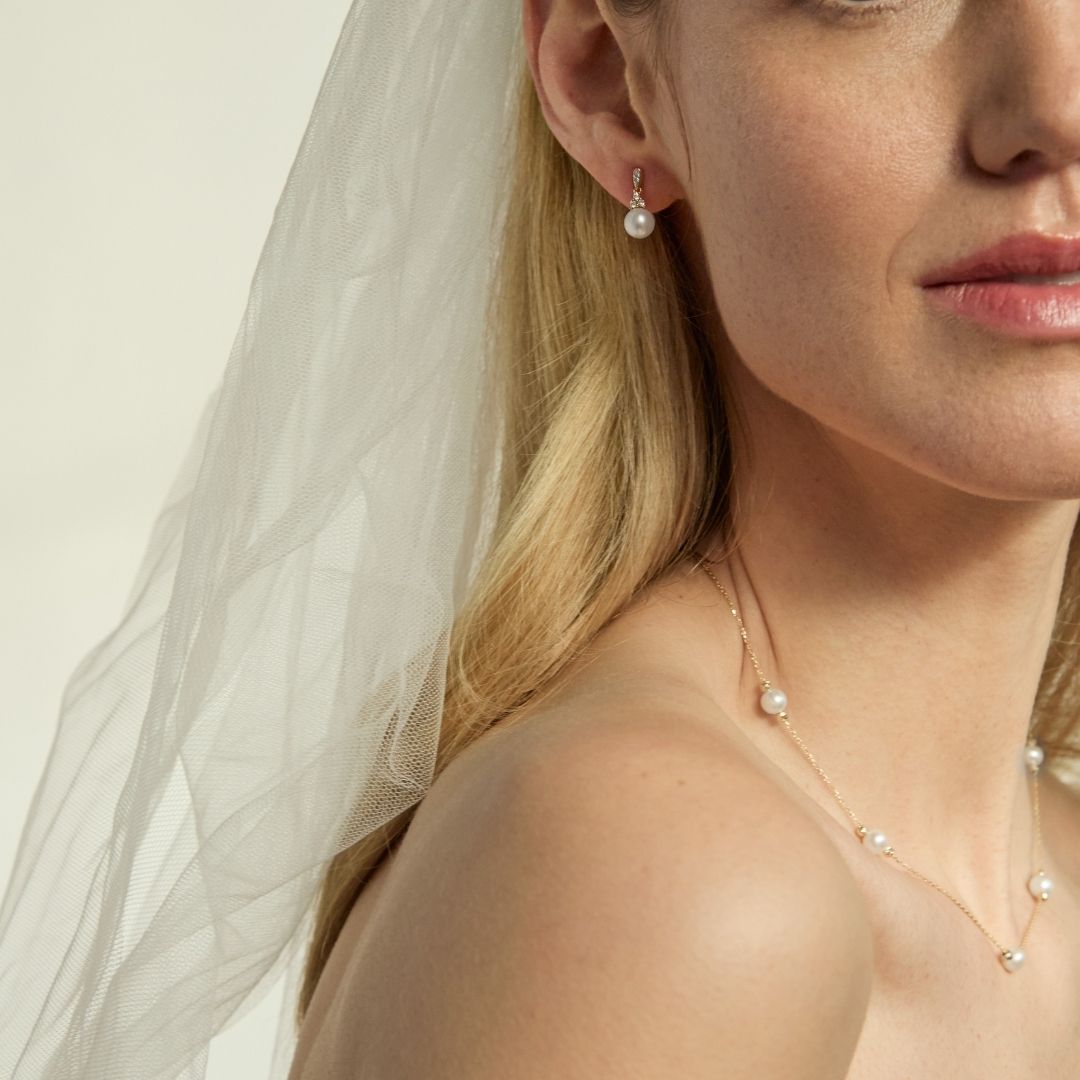 model wearing 9ct gold bridal pearl jewellery