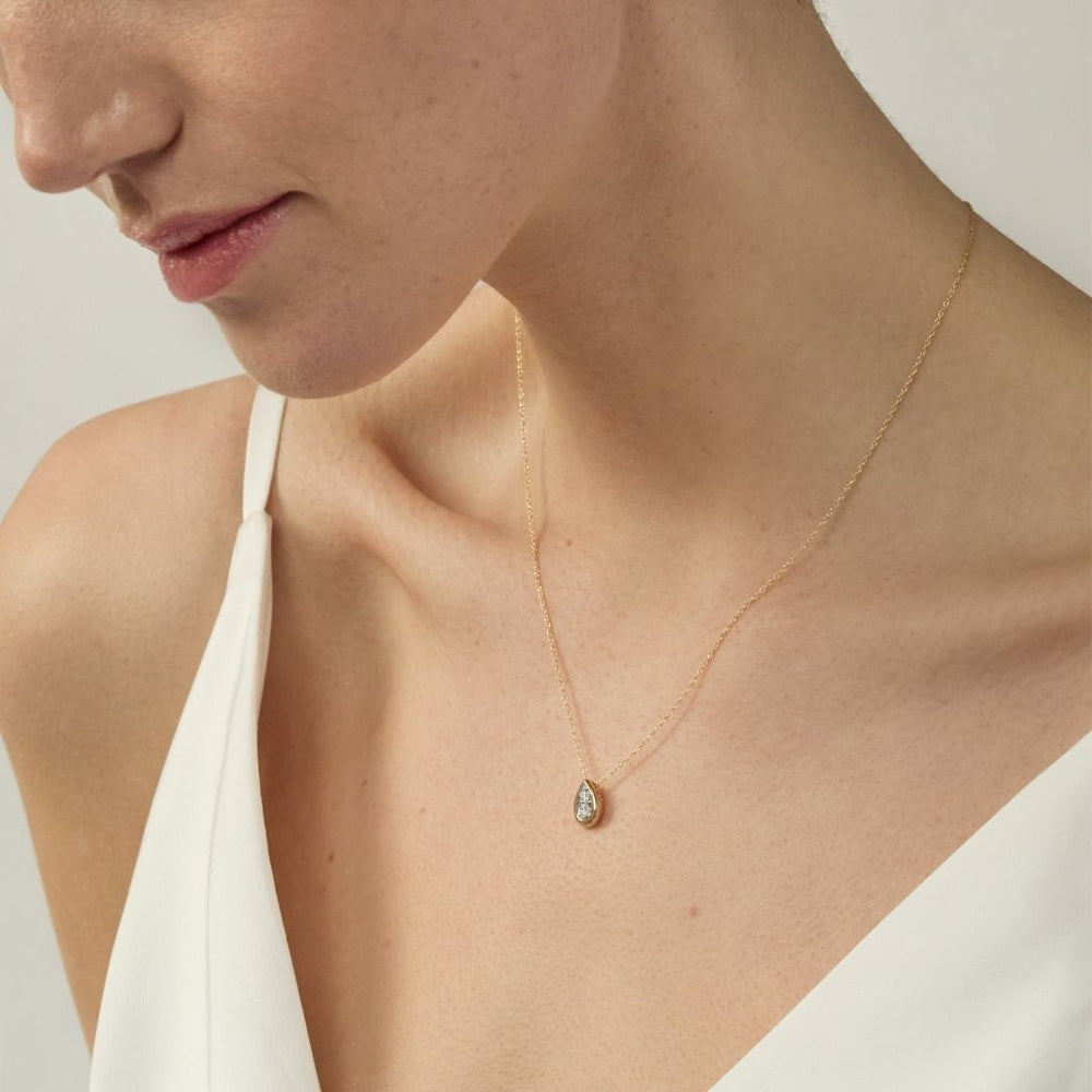 model wearing 9ct gold diamond necklace