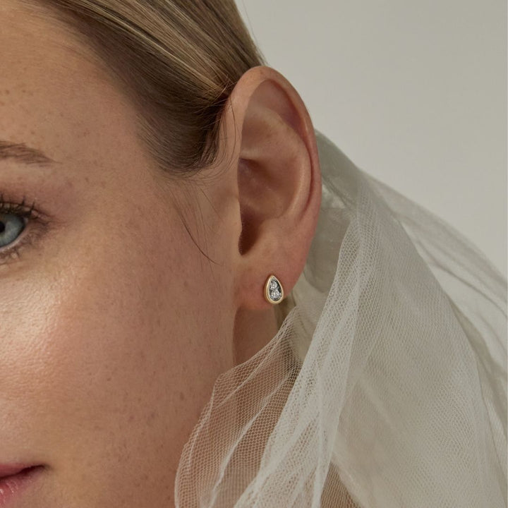 9ct gold diamond stud earrings on bride