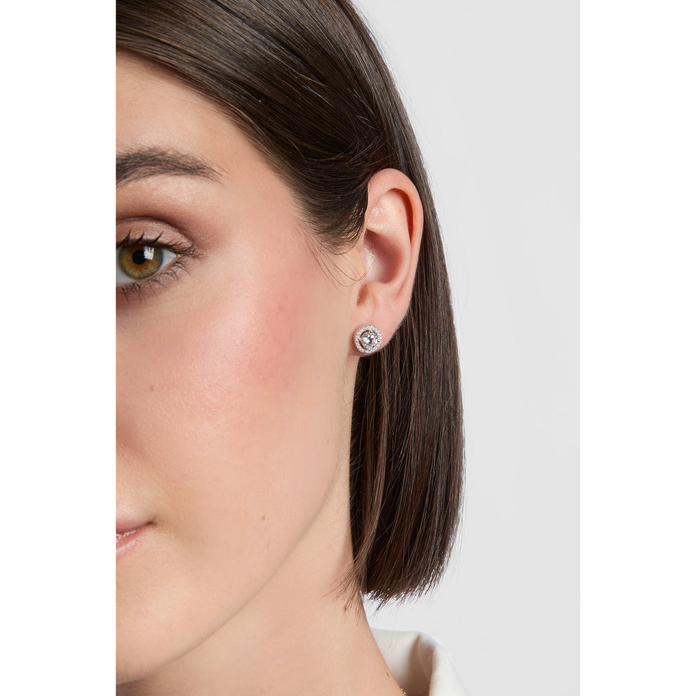 model wearing sterling silver cz halo stud earrings