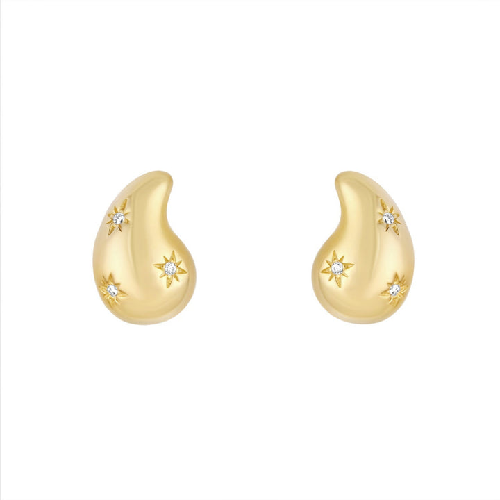 gold cubic zirconia star teardrop stud earrings on white background