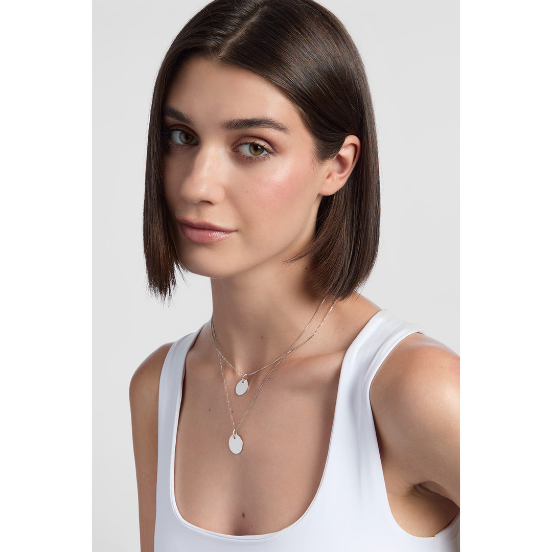 model wearing sterling silver solid 17mm Engravable Disc Pendant