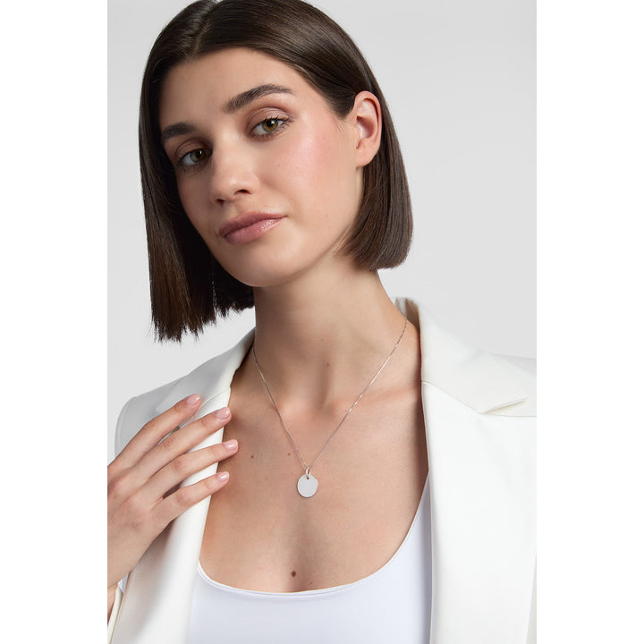 model wearing sterling silver solid 17mm Engravable Disc Pendant