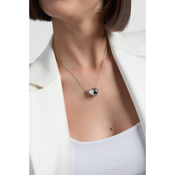 model wearing sterling silver teardrop pendant necklace