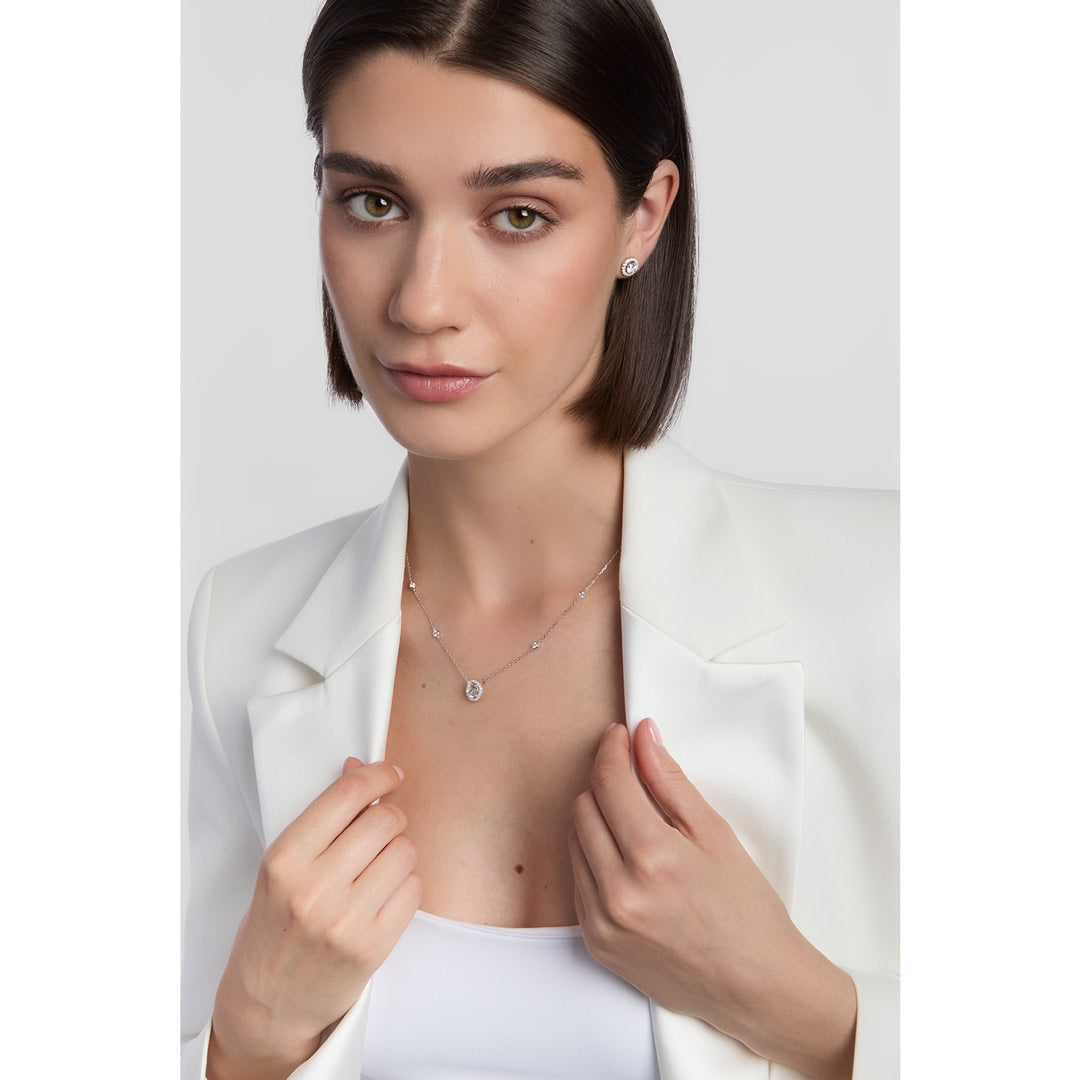 model wearing silver cz cluster necklace