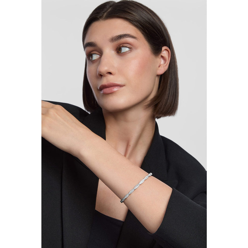 model wearing silver twisted bangle