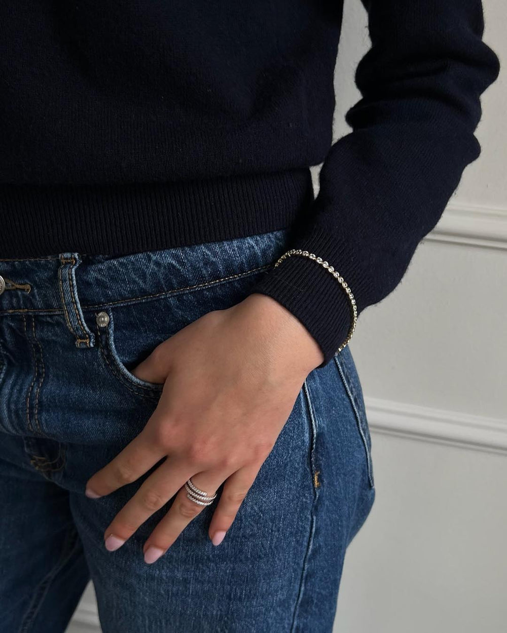 model wearing gold plated rubover tennis bracelet 