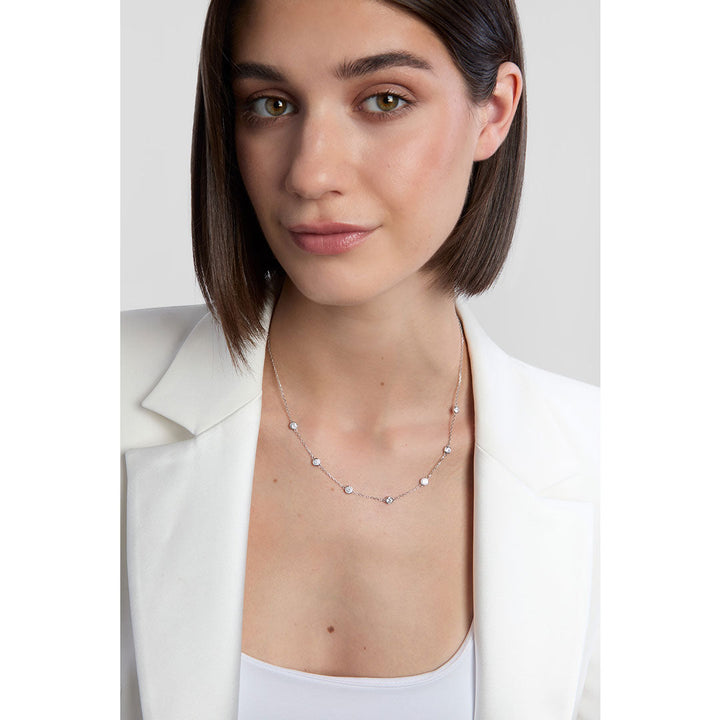 model wearing silver cz necklace