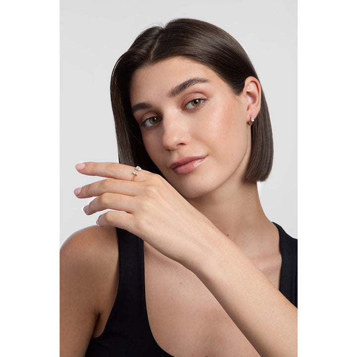 model wearing gold torque ring