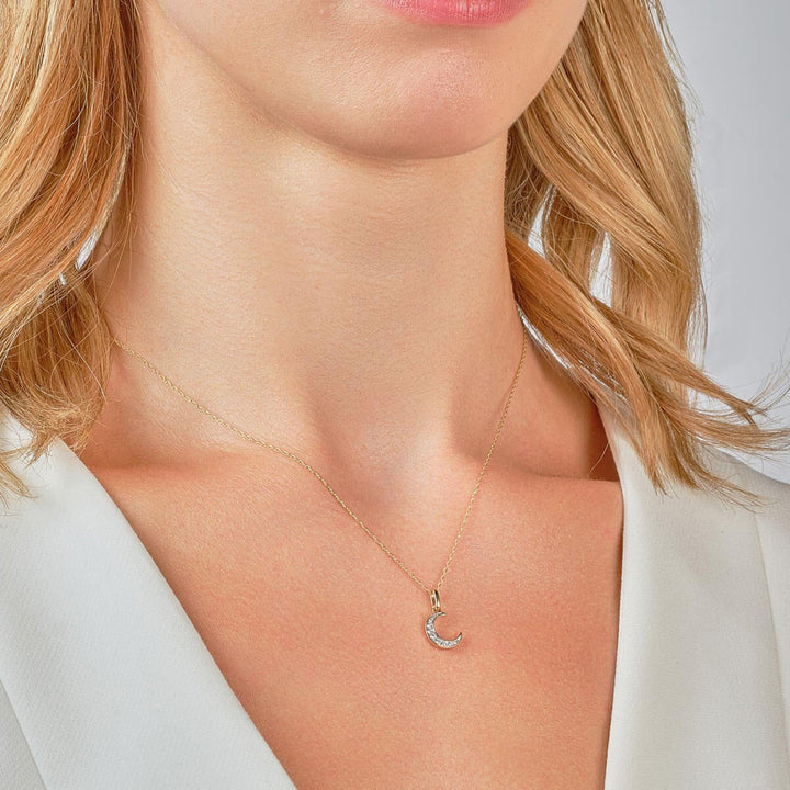 9ct gold diamond moon necklace on model