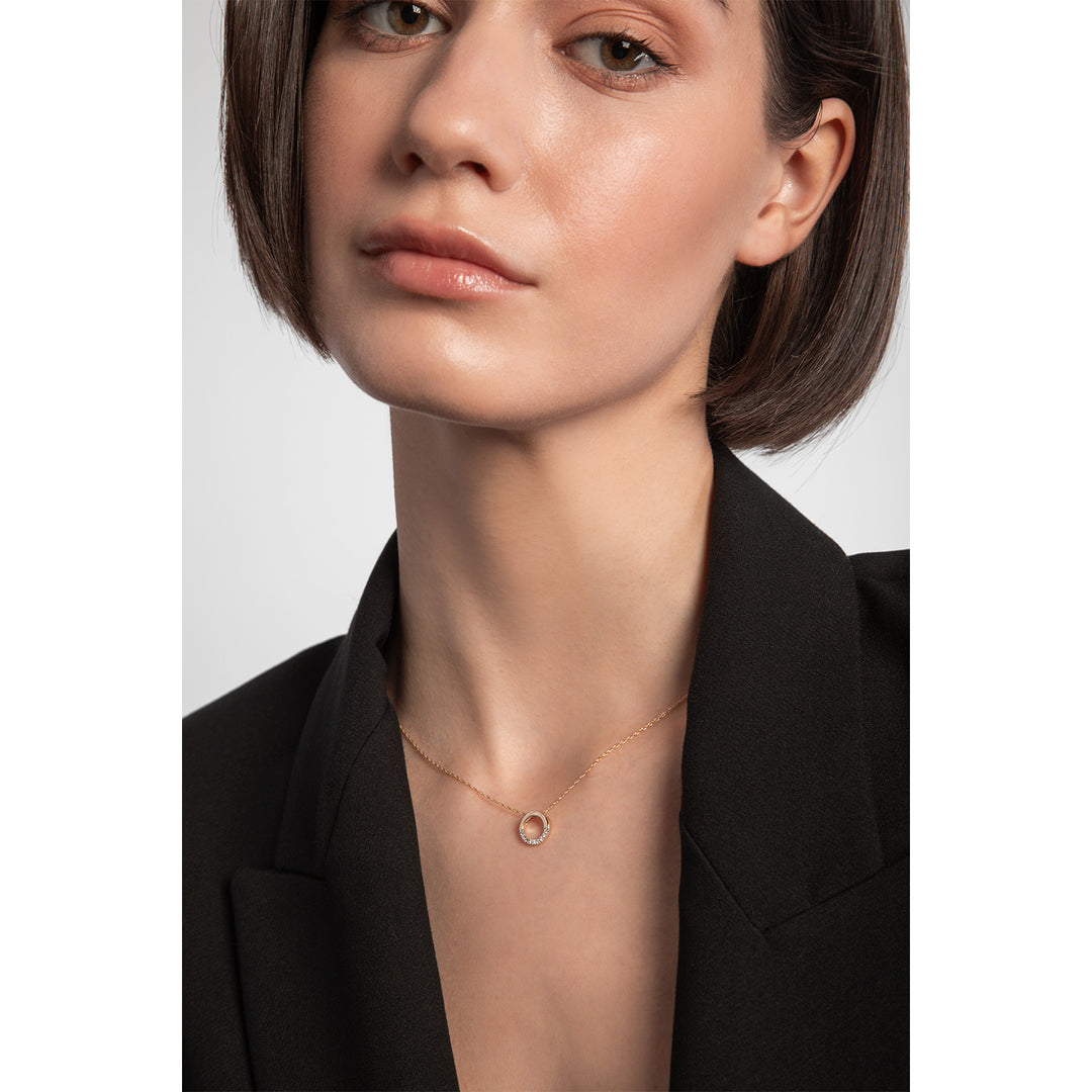 9ct gold half diamond circle necklace on model